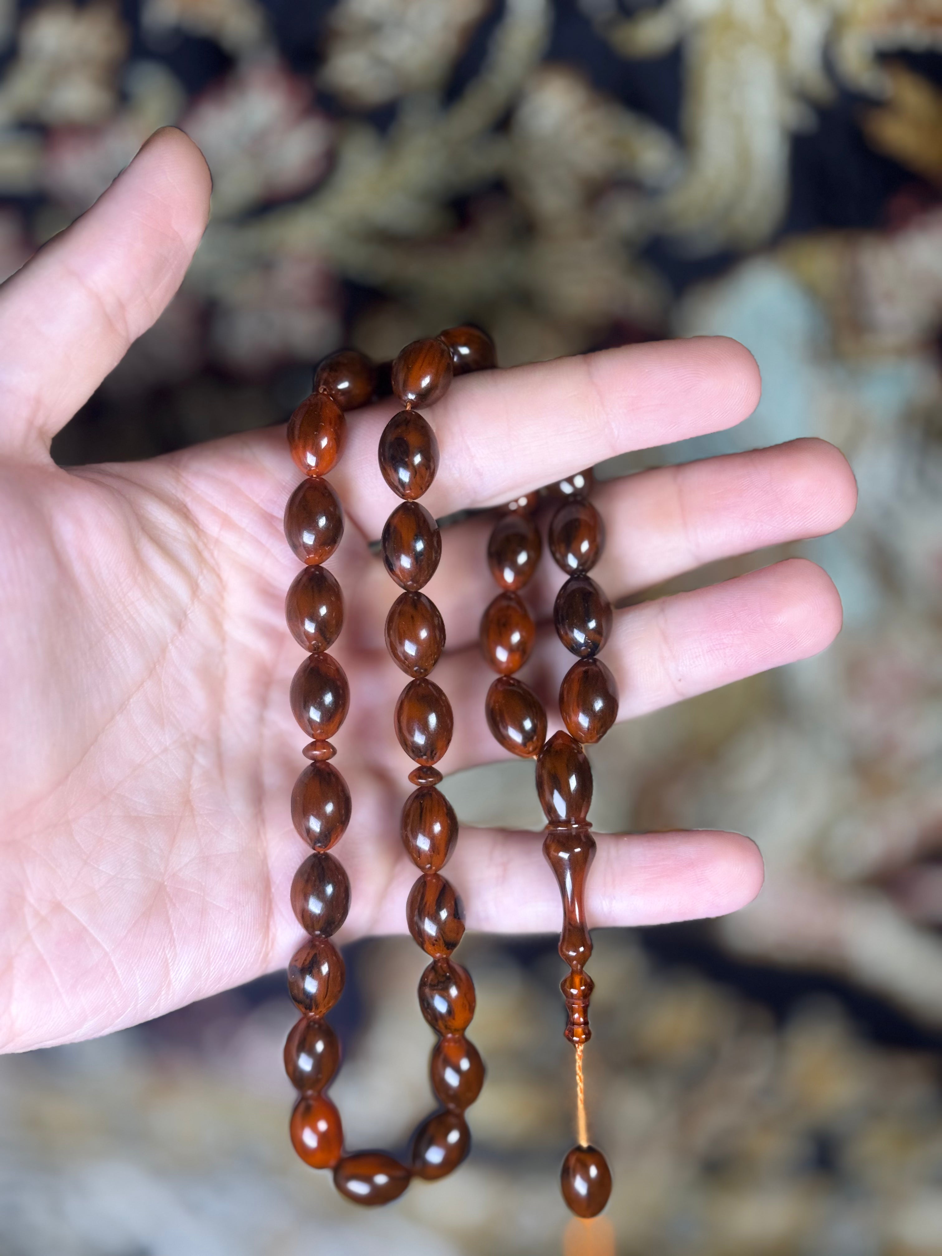 مسباح بكلايت بني بعرق أسود